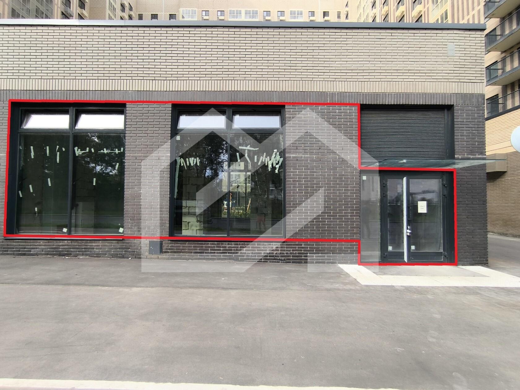 ГП16969008.Нежилое помещение.Фасад здания с выделенными окнами реализуемого объекта.jpg