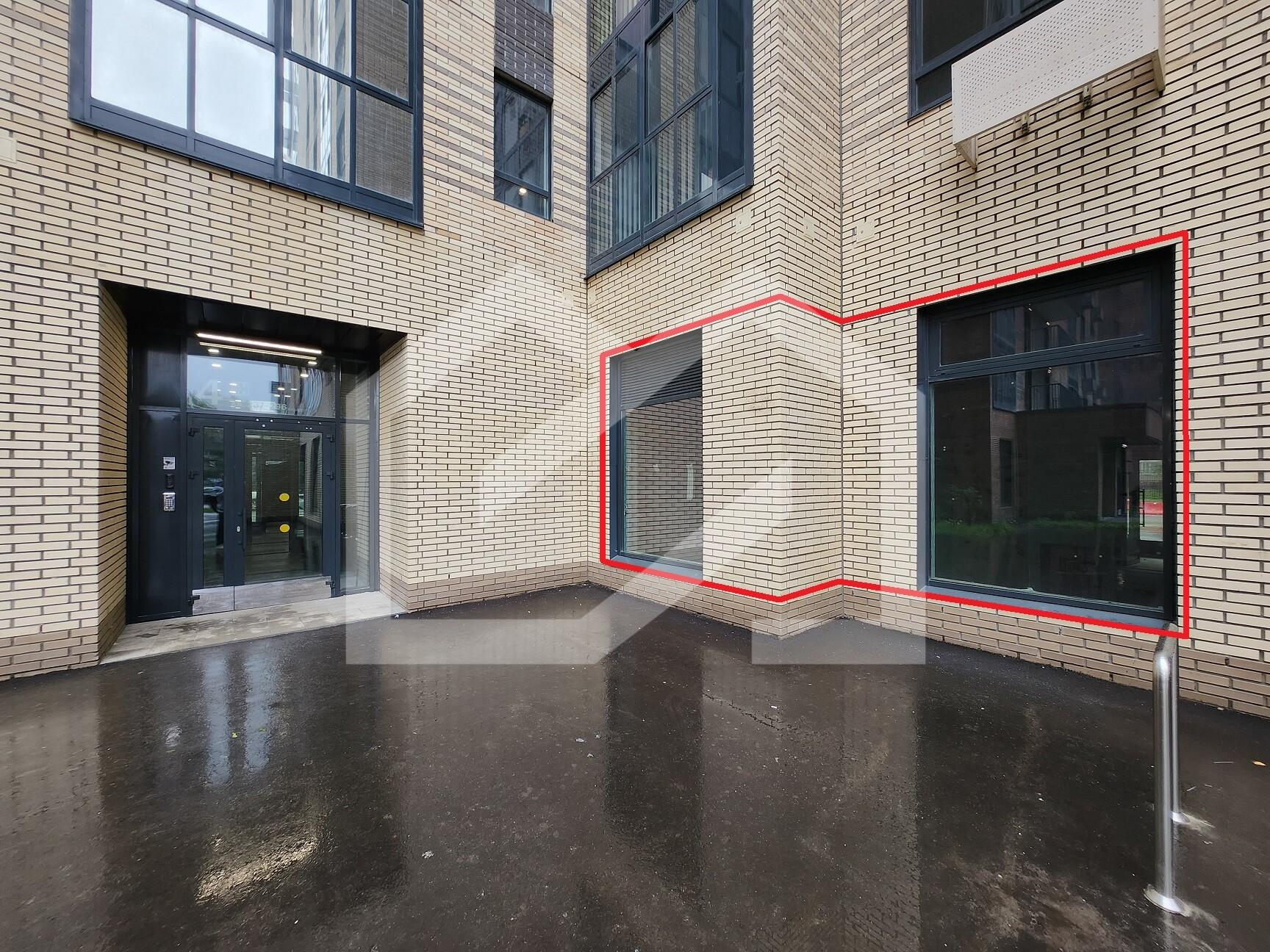 ГП16969314.Нежилое помещение.Фасад здания с выделенными окнами реализуемого объекта.jpg