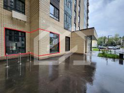 ГП16969315.Нежилое помещение.Фасад здания с выделенными окнами реализуемого объекта.jpg