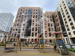 ГП16970184.Нежилое помещение.Фасад здания с выделенными окнами реализуемого объекта_2.jpg